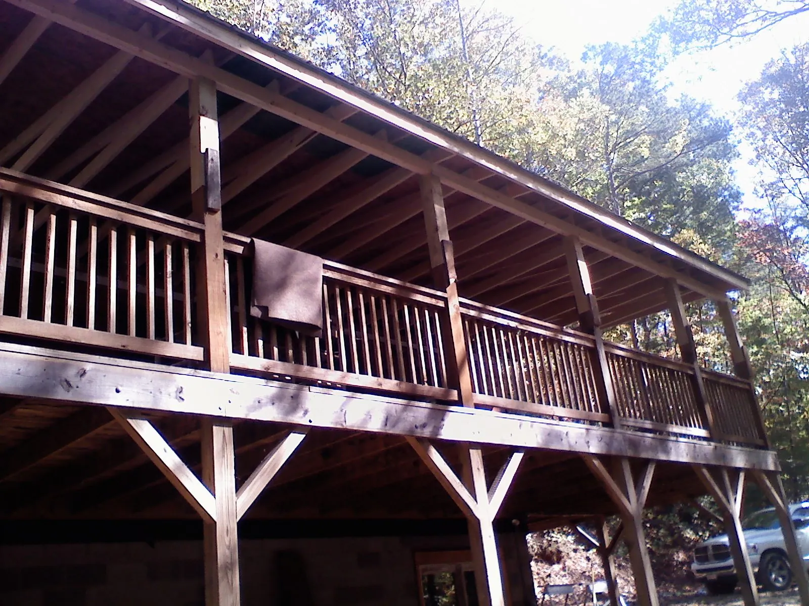 Timber framing under a new elevated porch and deck — Roof Leak Repair in Delmont by Roofing Brothers
